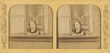 Little girl leaning out of an open window, arms crossed, 1855-1865. Creator: Levy Fils & Cie