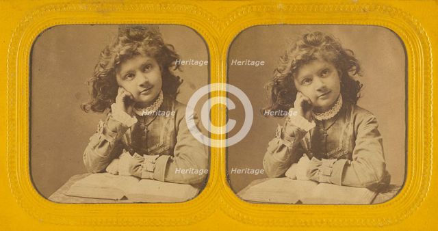 Little girl seated with hand on cheek, open book in front of her, 1855-1860. Creator: Unknown.