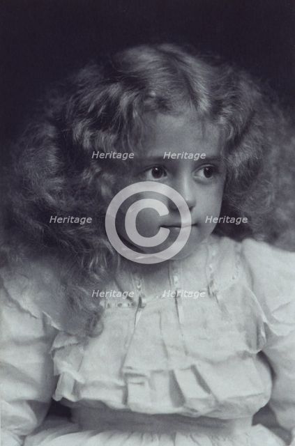 Little girl with fair, wavy hair, c1900. Creator: Addie Kilburn Robinson.