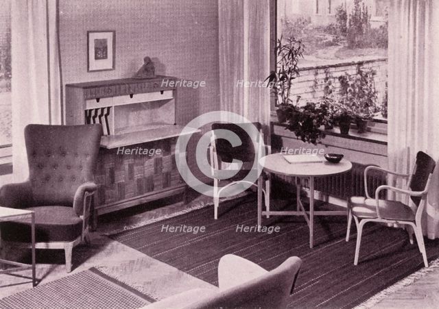 'Living-room furniture by Carl-Axel Acking, made by A.B. Svenska Mobelfabrikerna', 1949. Creator: Unknown.