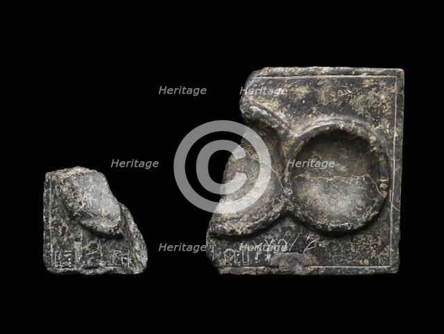 Libation table fragment; corner and part of two circular receptacles, c2325-c2175BC.. Artist: Unknown.