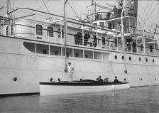 Liberty's motor launch alongside Liberty 1914. Creator: Kirk & Sons of Cowes