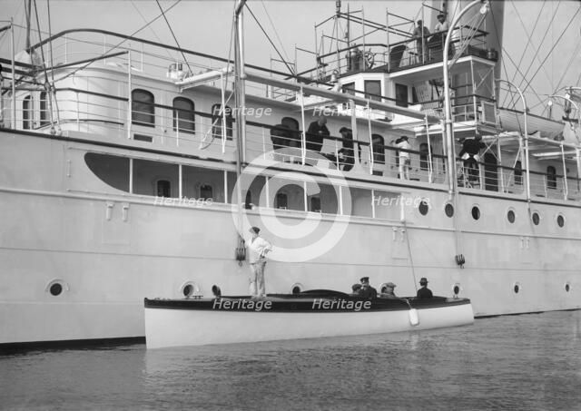 Liberty's motor launch alongside 'Liberty', 1914. Creator: Kirk & Sons of Cowes.