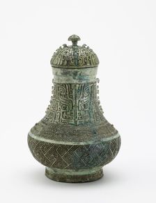 Lidded ritual wine container (hu) with masks and dragons, Late Shang dynasty, c13th century BCE. Creator: Unknown