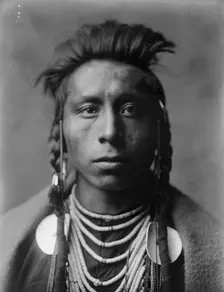 Lies Sideway, c1908. Creator: Edward Sheriff Curtis