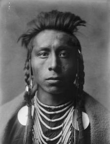 Lies Sideway, c1908. Creator: Edward Sheriff Curtis