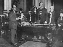 Lieut. Bell, R.N.R., captain of the Thordis, being presented by the Lord Mayor of London with the r