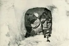 Lieut. Evans and Nelson Cutting a Cave for Cold Storage 12 January 1911, (1913). Artist: Herbert Ponting