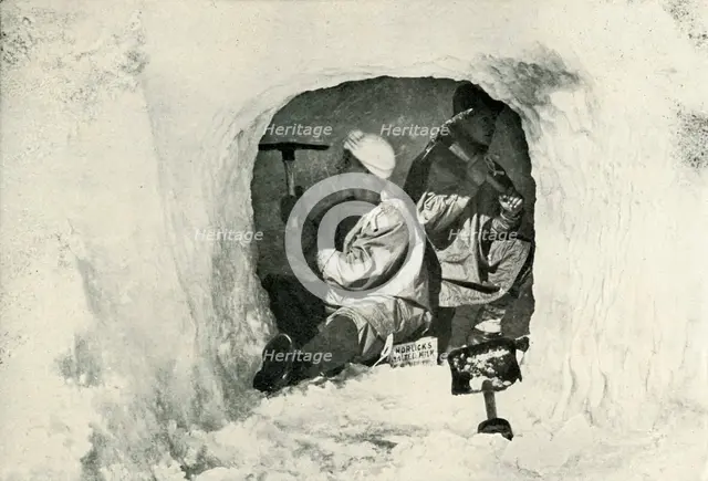 'Lieut. Evans and Nelson Cutting a Cave for Cold Storage', 12 January 1911, (1913). Artist: Herbert Ponting.