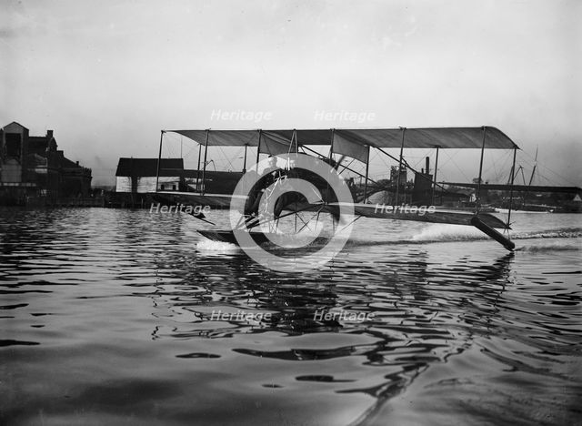 Lieutenant Theodore G. Ellyson, U.S.Navy, Testing Seaplane On Potomac, 1911. Creator: Harris & Ewing.