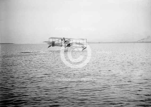 Lieutenant Theodore G. Ellyson, U.S.Navy, Testing Seaplane On Potomac, 1911. Creator: Harris & Ewing.