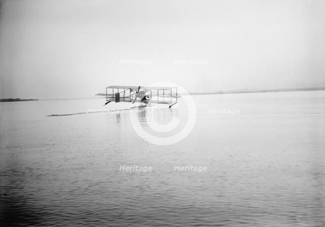 Lieutenant Theodore G. Ellyson, U.S.Navy, Testing Seaplane On Potomac, 1911. Creator: Harris & Ewing.