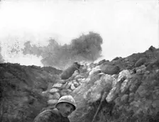 Life in the trenches in Champagne; A torpedo explodes at some distance..., 1917. Creator: Unknown