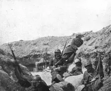 Life in the trenches in Champagne; Calm: "correspondence and cigarettes, 1917. Creator: Unknown