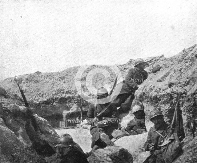 Life in the trenches in Champagne; Calm: "correspondence and cigarettes, 1917. Creator: Unknown.
