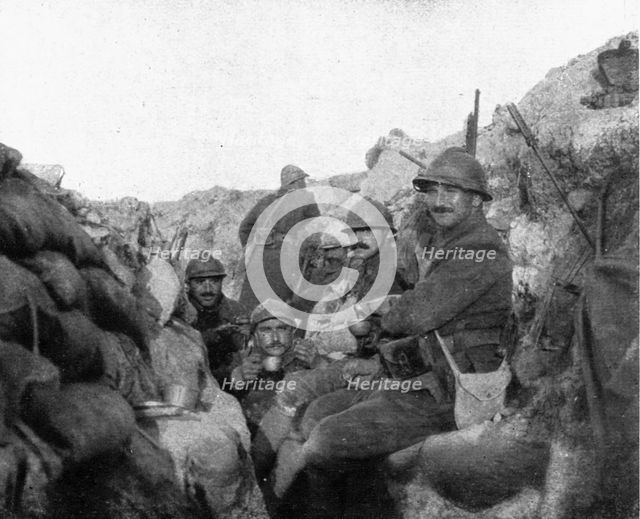 Life in the trenches in Champagne; Calm: "le pinard"', 1917. Creator: Unknown.