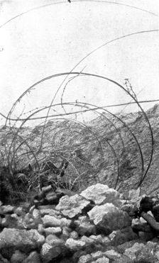 Life in the trenches in Champagne; In the wires of an adjoining trench..., 1917. Creator: Unknown