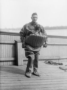 Life Saving Suit Worn By T. Aud, 1916. Creator: Harris & Ewing