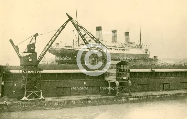 'Lifitng a "Majestic" (56,551 Tons) in the Floating Dock at Southampton', c1930. Creator: Unknown.