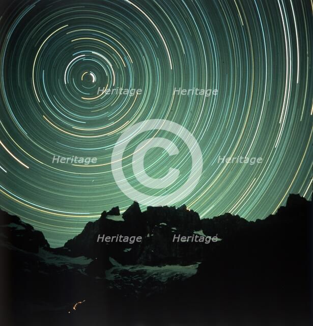 Light effects over La Meije, France. Creator: NASA.