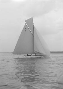 Light winds for the 8 Metre Ventana (H11) sailing with spinnaker, 1912. Creator: Kirk & Sons of Cowes
