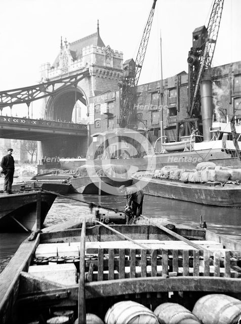 Lighters approaching the General Steam Navigation Company's wharf by Tower Bridge, London, c1905. Artist: Unknown