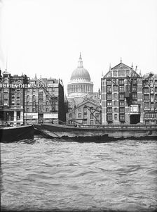 Lighters passing St Paul's Wharf with St Paul's Cathedral in the background, London, c1905