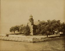 Lighthouse at end of ship canal, St. Clair Lake... near Bayfield, Wisconsin, 1903. Creator: Frances Benjamin Johnston