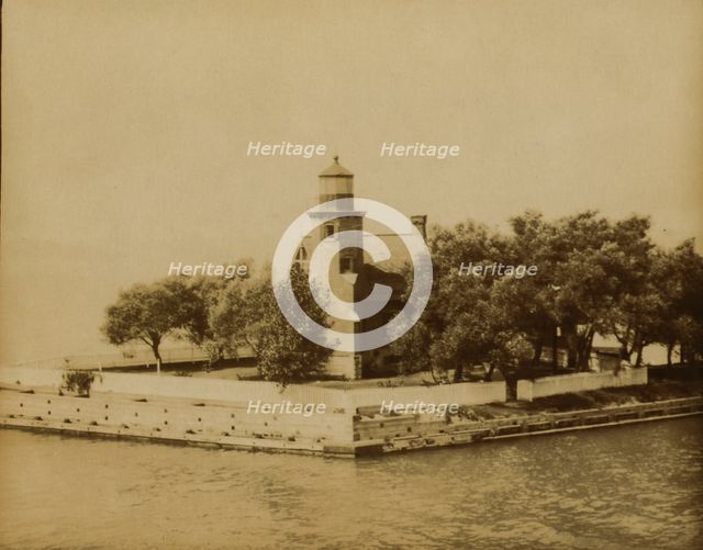 Lighthouse at end of ship canal, St. Clair Lake... near Bayfield, Wisconsin, 1903. Creator: Frances Benjamin Johnston.