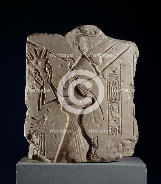 Limestone fragment of Queen Nefertiti offering a bouquet to Aten, XVIIIth Dynasty, c1540-1292BC Artist: Unknown.