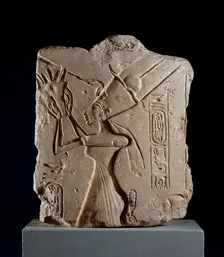 Limestone fragment of Queen Nefertiti offering a bouquet to Aten, XVIIIth Dynasty, c1540-1292BC