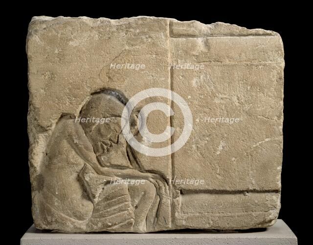 Limestone fragment carved relief of sleepy servant, XVIIIth Dynasty, c1540-c1292BC. Artist: Unknown.