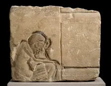 Limestone fragment carved relief of sleepy servant, XVIIIth Dynasty, c1540-c1292BC