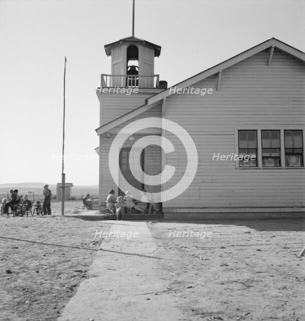 Lincoln Bench School and yard, near Ontario, Malheur County, Oregon, 1939. Creator: Dorothea Lange.
