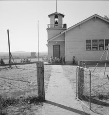 Lincoln Bench School and yard, near Ontario, Malheur County, Oregon, 1939. Creator: Dorothea Lange