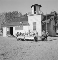 Lincoln Bench School and yard, near Ontario, Malheur County, Oregon, 1939. Creator: Dorothea Lange