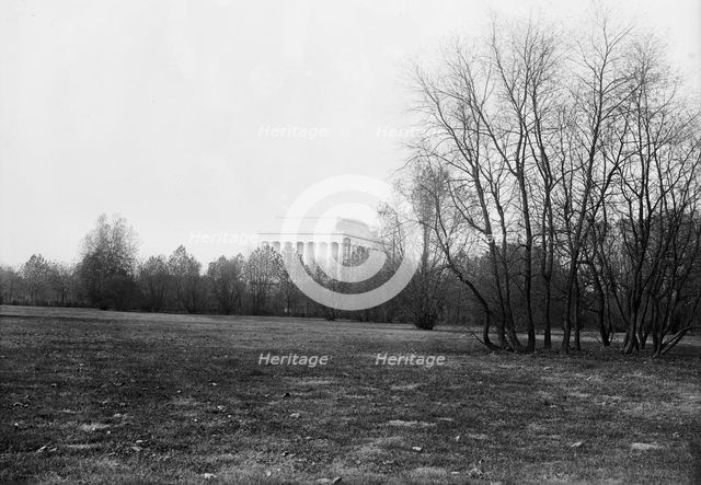 Lincoln Memorial Through Foliage of Potomac Park, 1917. Creator: Harris & Ewing.