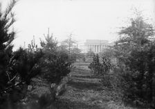 Lincoln Memorial Through Foliage of Potomac Park, 1917. Creator: Harris & Ewing