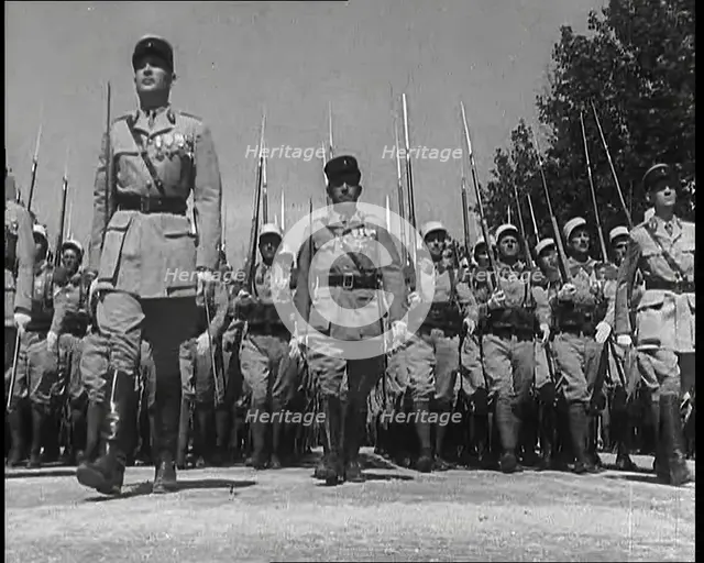 Lines of Male French Foreign Legion Soldiers Marching Towards the Camera During the Bastille...,1939 Creator: British Pathe Ltd.