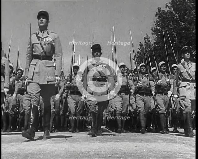 Lines of Male French Foreign Legion Soldiers Marching Towards the Camera During the Bastille...,1939 Creator: British Pathe Ltd.