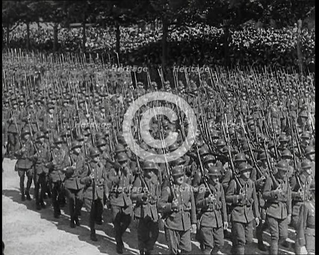 Lines of Male French Soldiers Marching Down the Champs Elysees During a Bastille Day..., 1939. Creator: British Pathe Ltd.