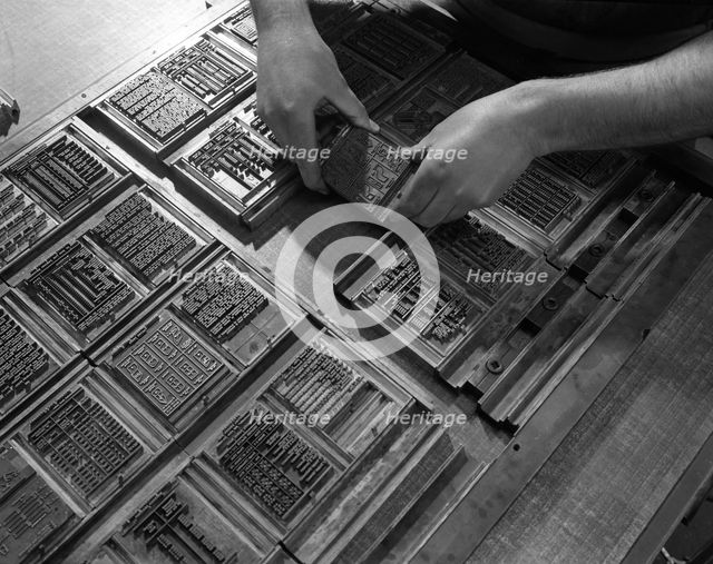 Linotype block being set in the dye at a printworks, Mexborough, South Yorkshire, 1959. Artist: Michael Walters