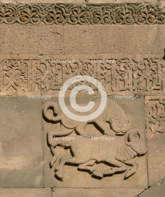 Lion attacking bull. Portal of the Ulu Camii (Great Mosque) of Diyarbakir.