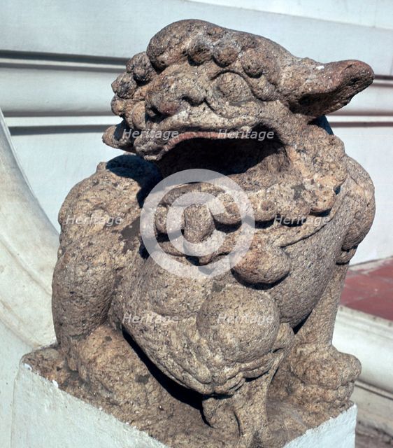 Lion guardian on the steps of a Buddhist temple. Artist: Unknown