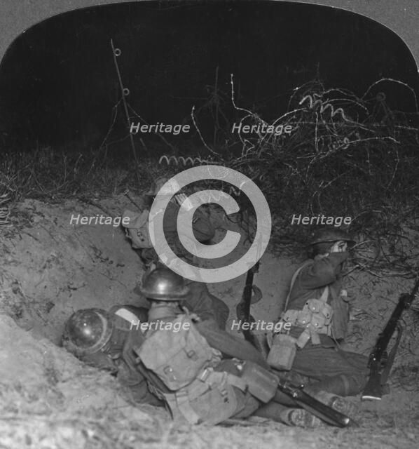 Listening post in a shell hole in No Man's Land, near Lagnicourt, France, World War I, c1914-c1918. Artist: Realistic Travels Publishers