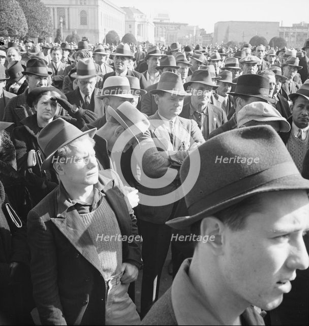 Listening to speeches at mass meeting of WPA workers protesting..., San Francisco, California, 1939. Creator: Dorothea Lange.