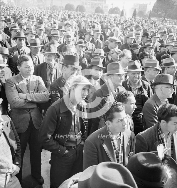 Listening to speeches at mass meeting of WPA workers protesting..., San Francisco, California, 1939. Creator: Dorothea Lange.