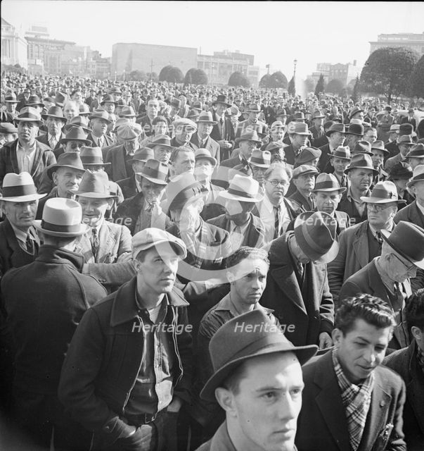 Listening to speeches at mass meeting of WPA workers protesting..., San Francisco, California, 1939. Creator: Dorothea Lange.