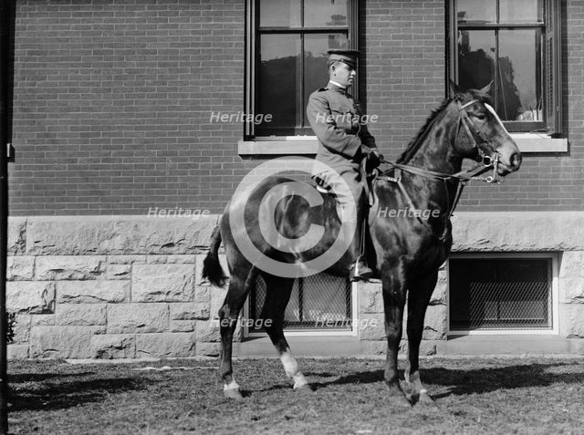 Lt. Victor S. Foster, 15th Cav., U.S.A., at Fort Myer, on 'Ace of Diamonds', 1911. Creator: Harris & Ewing.