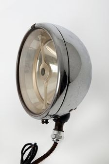 Lucas bi-flex long range electric headlamp circa 1928. Creator: Unknown
